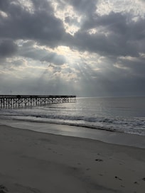 On the beach access when you walk down from the room, just a few steps away.