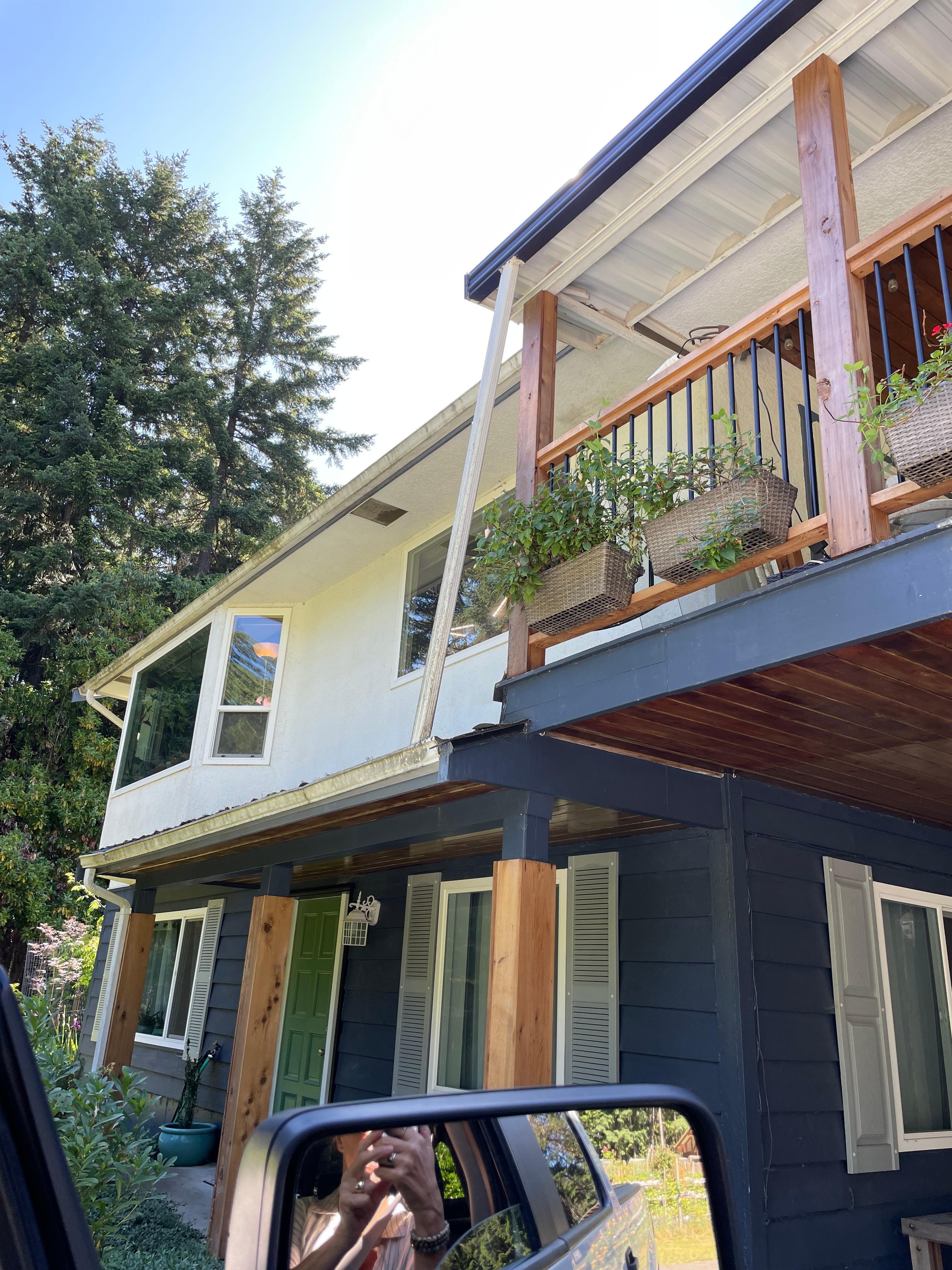 The entry is the green door bottom left. 