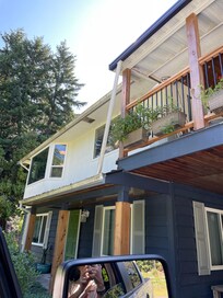 The entry is the green door bottom left.