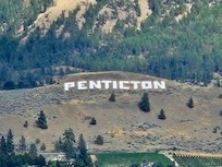 Directly across from the lake.