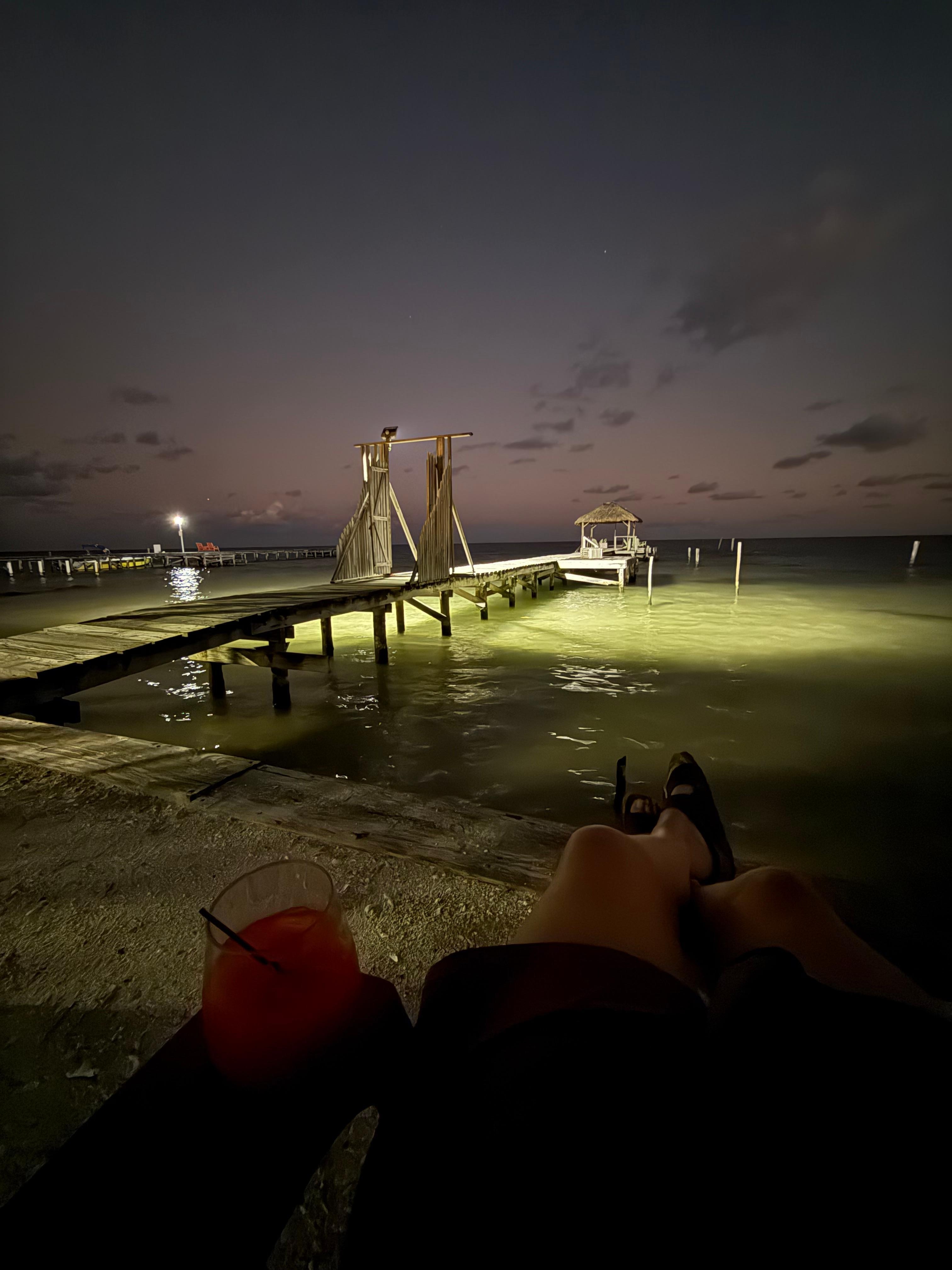 Beach and dock at night