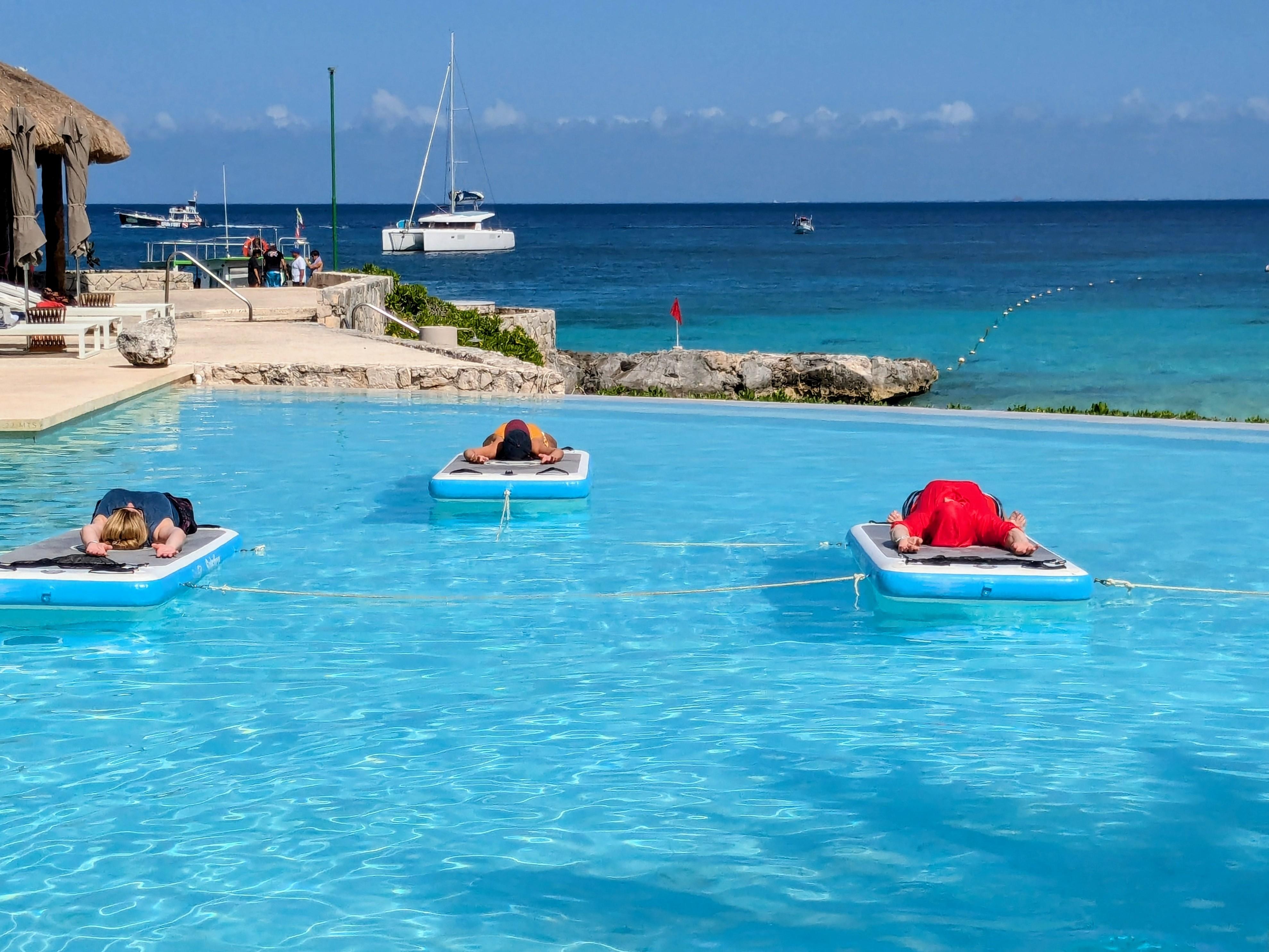 Instructor led yoga in the infinity pool. Every guest looked incredibly relaxed!