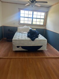 unmade and crooked bed