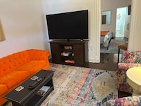 Big Smart TV and comfy sofa