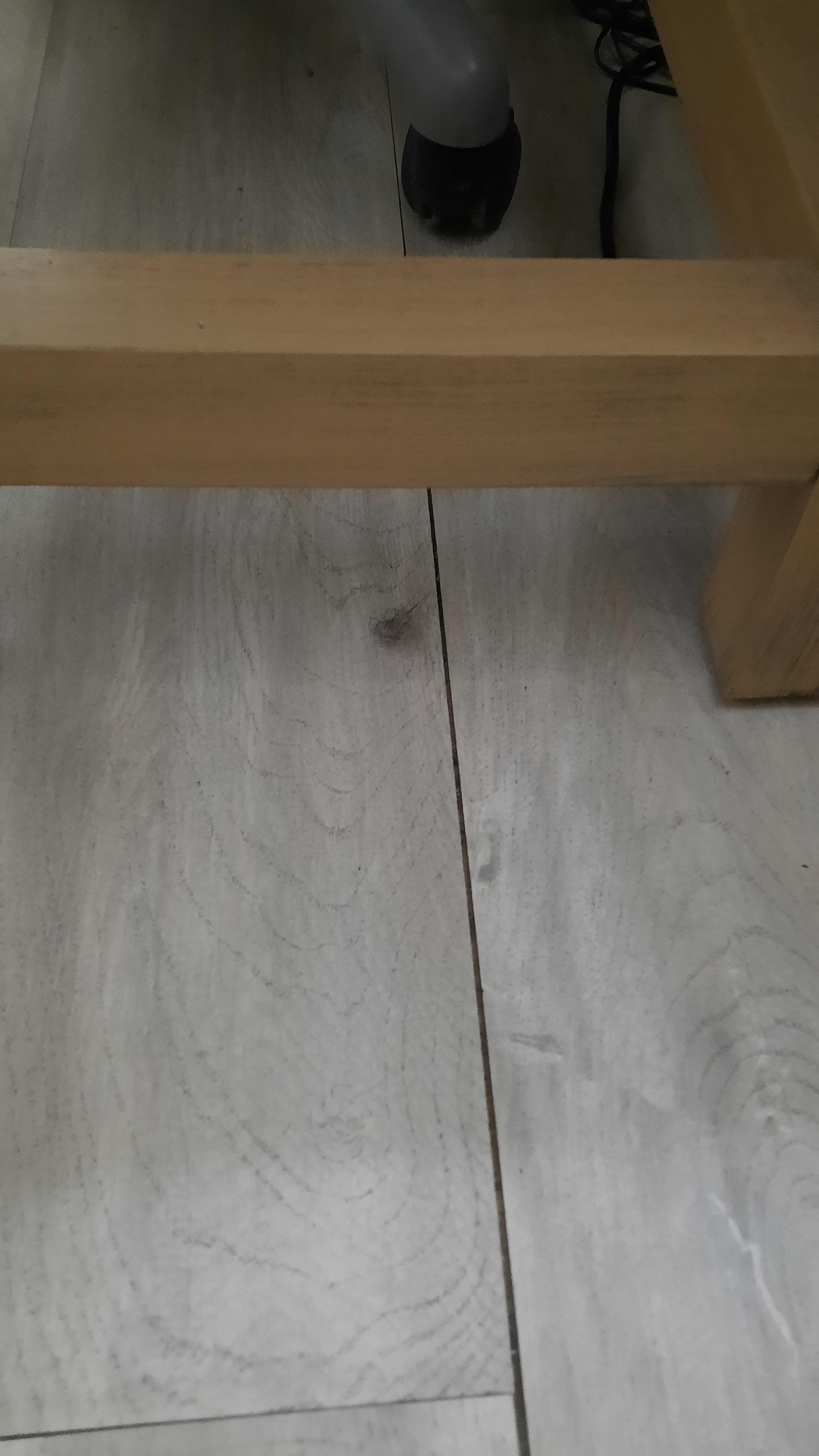 Dust balls in different areas of the room