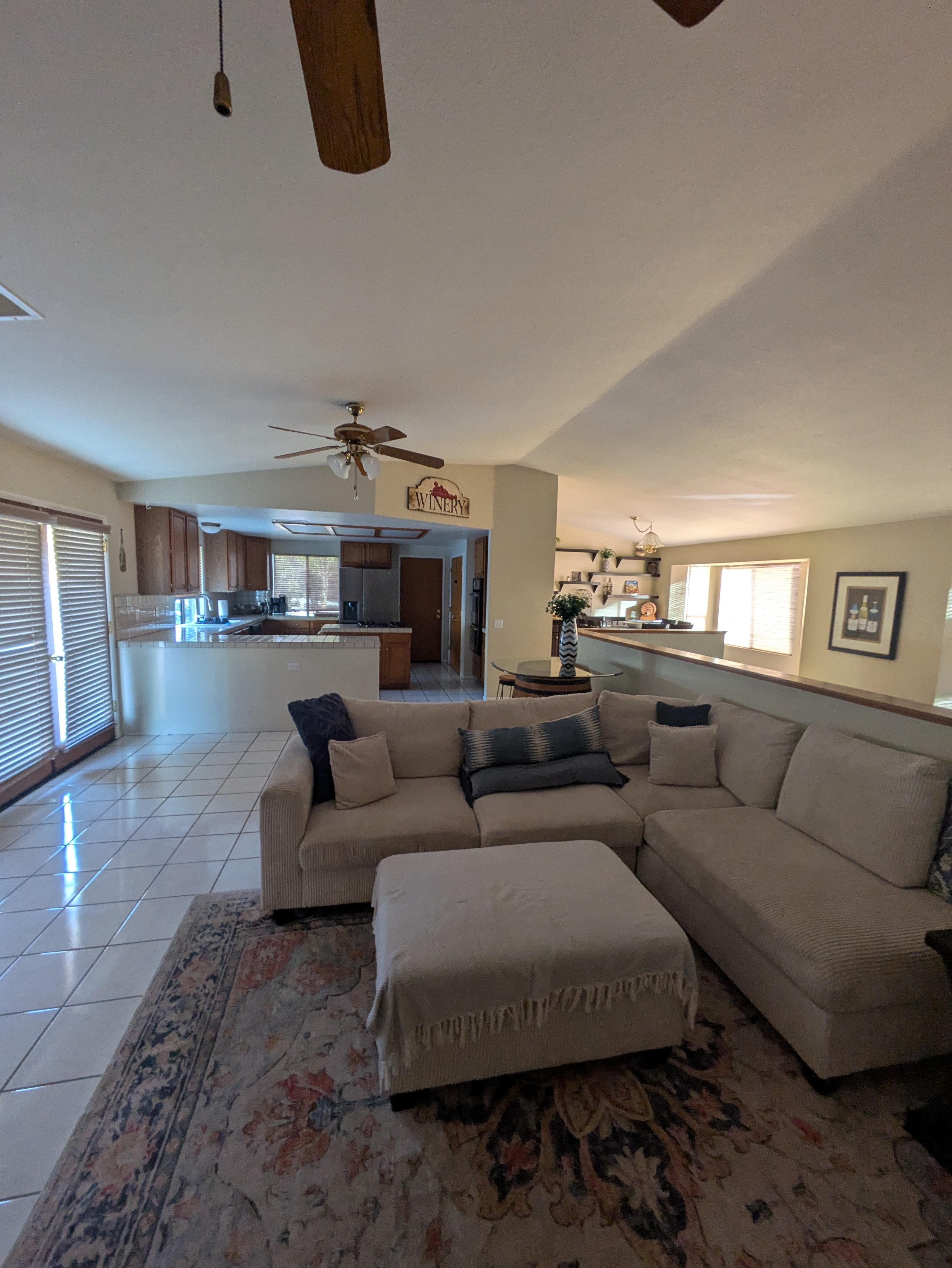 Living room, dining room and kitchen area