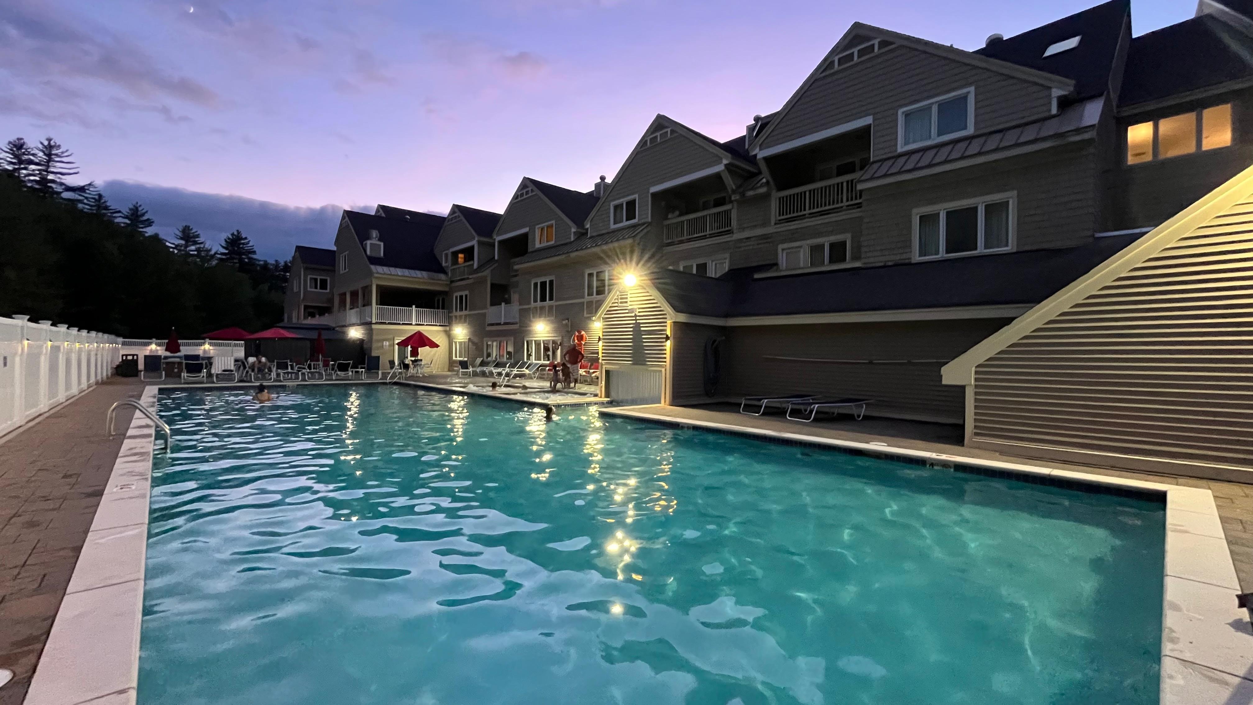 Heated outdoor pool with indoor entrance option and two hot tubs