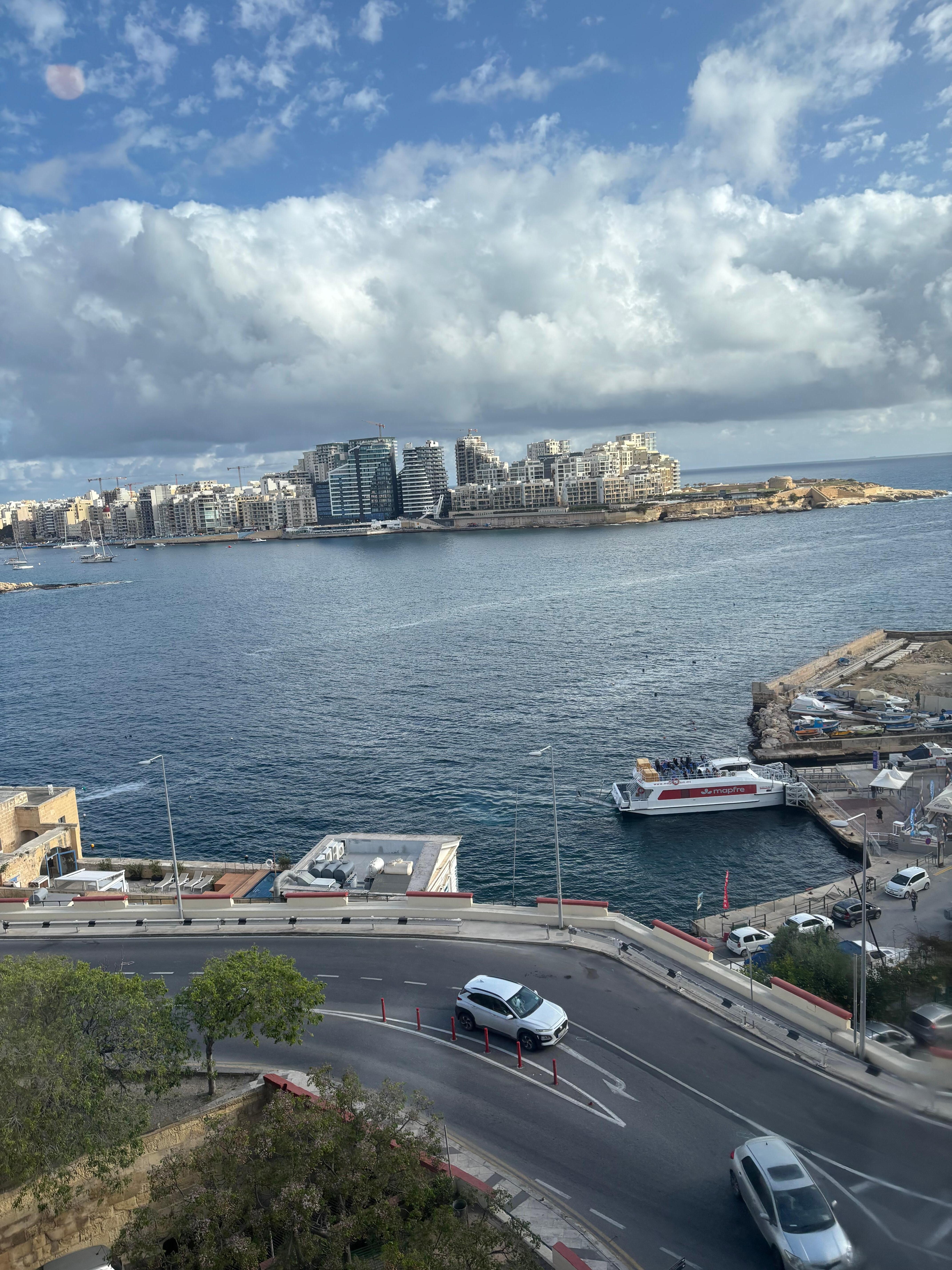 top floor view looking at Sliema and the Sliema ferry stop here at water level
