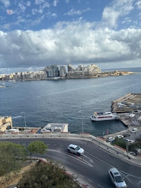 top floor view looking at Sliema and the Sliema ferry stop here at water level