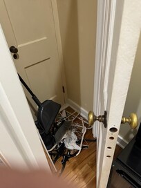 Clothes closet. Hanging bar had come out of the wall and was lying in pile of hangers and dirt