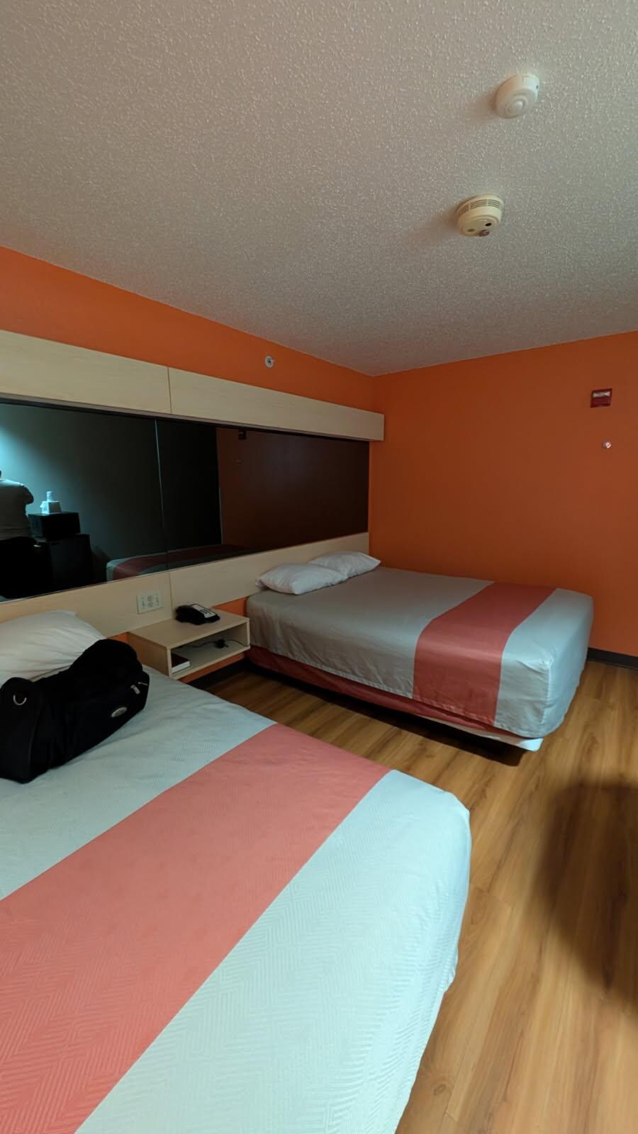 Very clean, walls are bright orange. Definitely a different color scheme! 