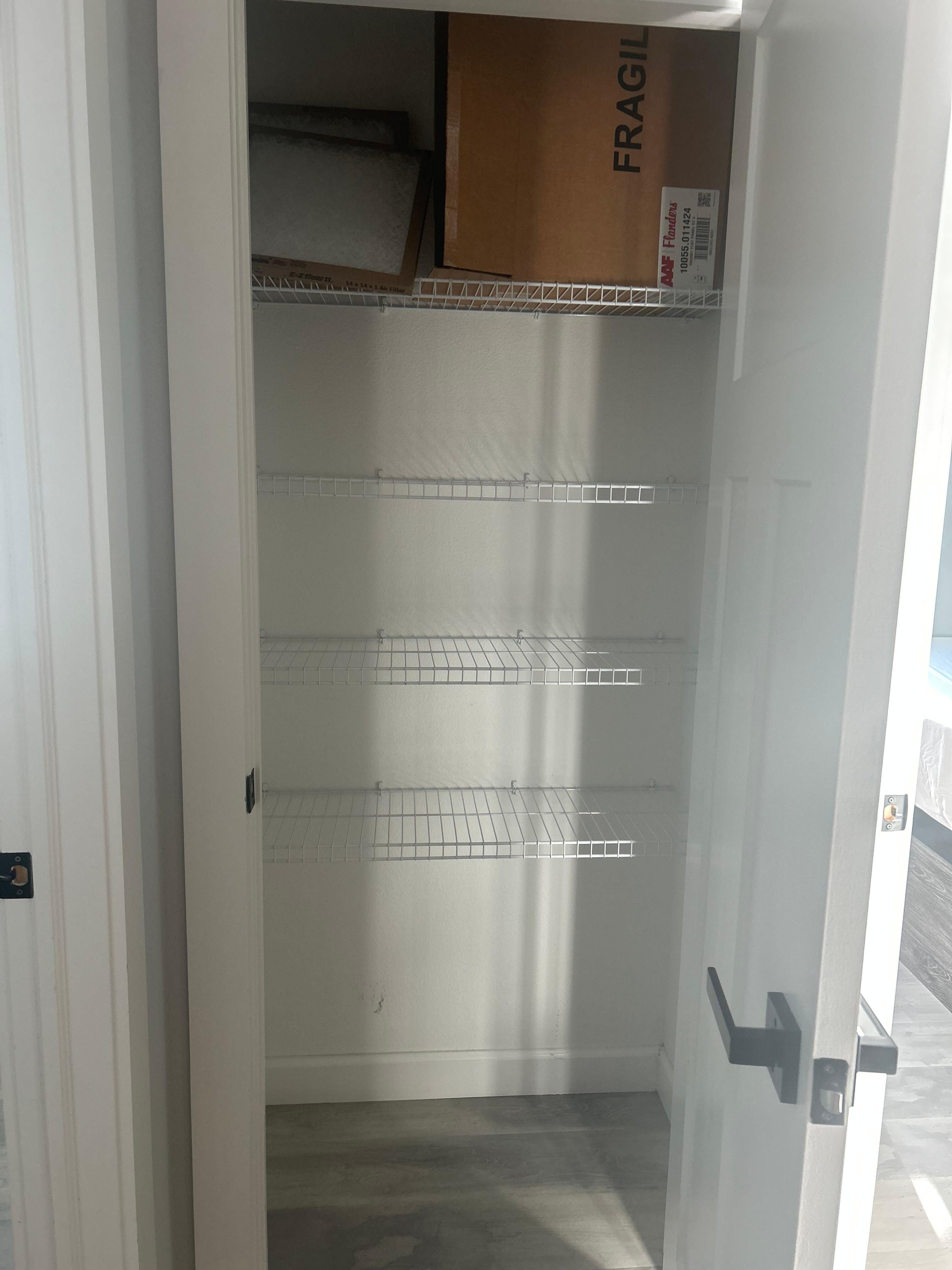 Empty linen closet 1.