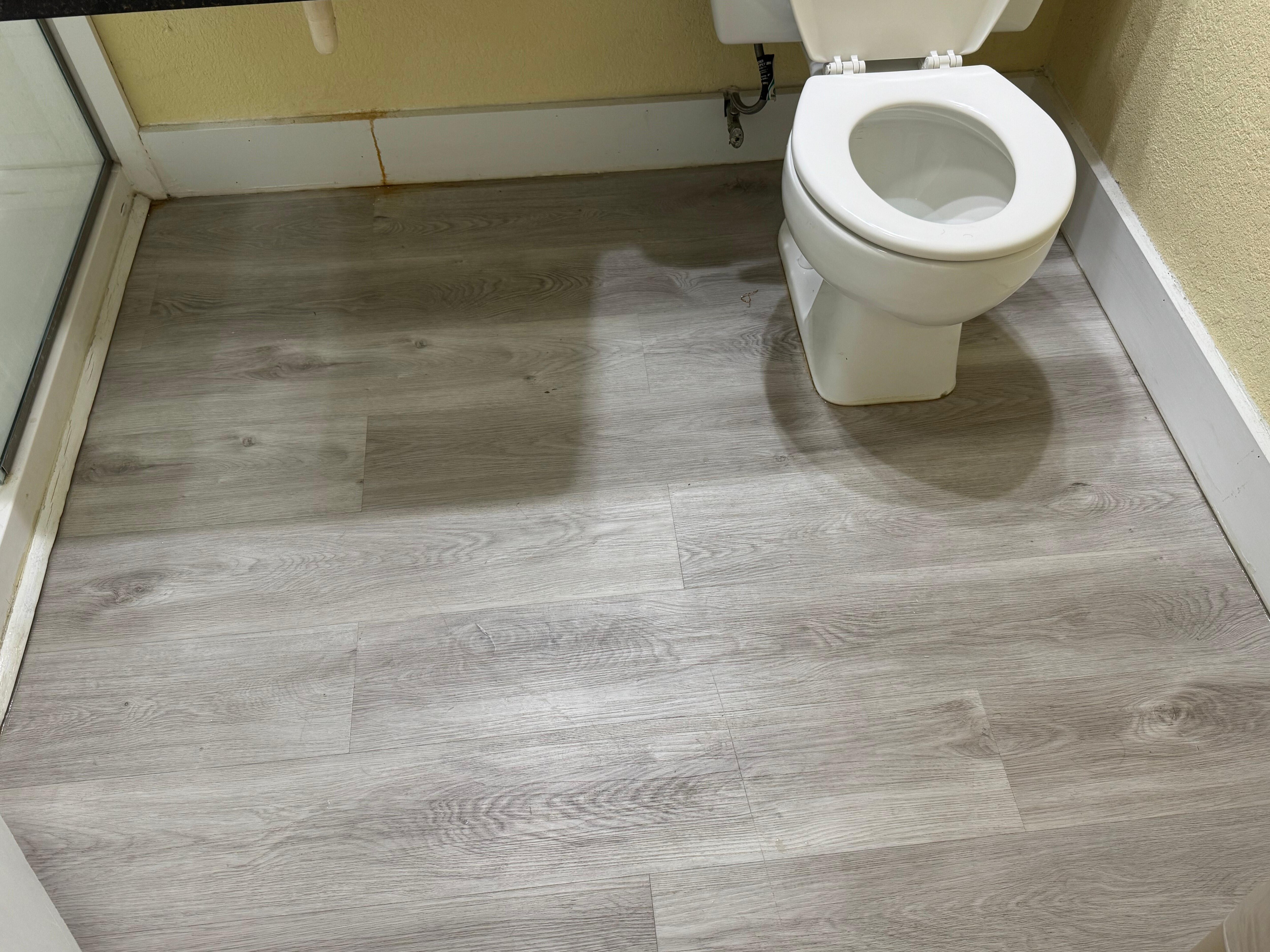 Attempting to show the sand on the floor in the bathroom