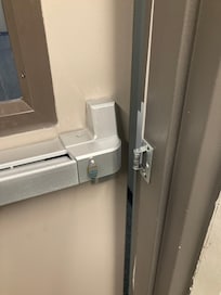 Fire door in position not to latvh