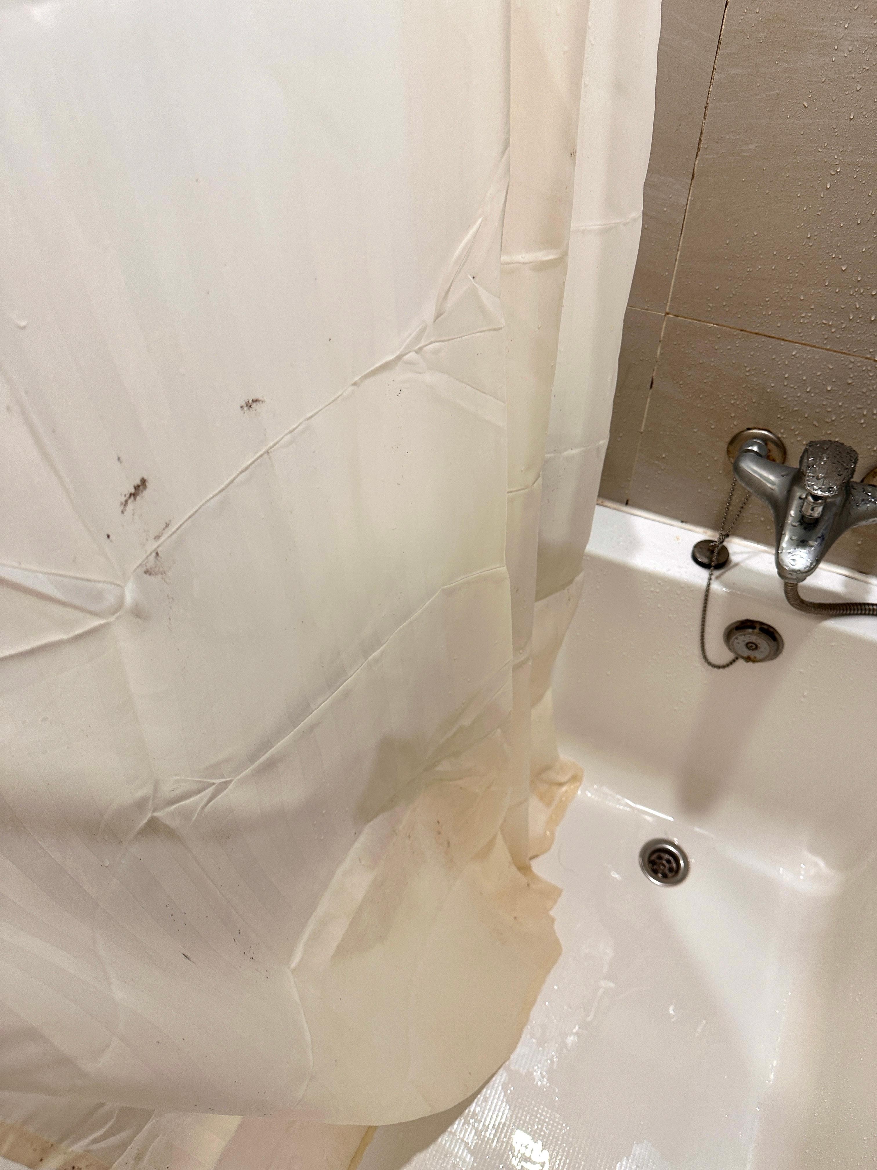 cheap shower curtains thats never been changed