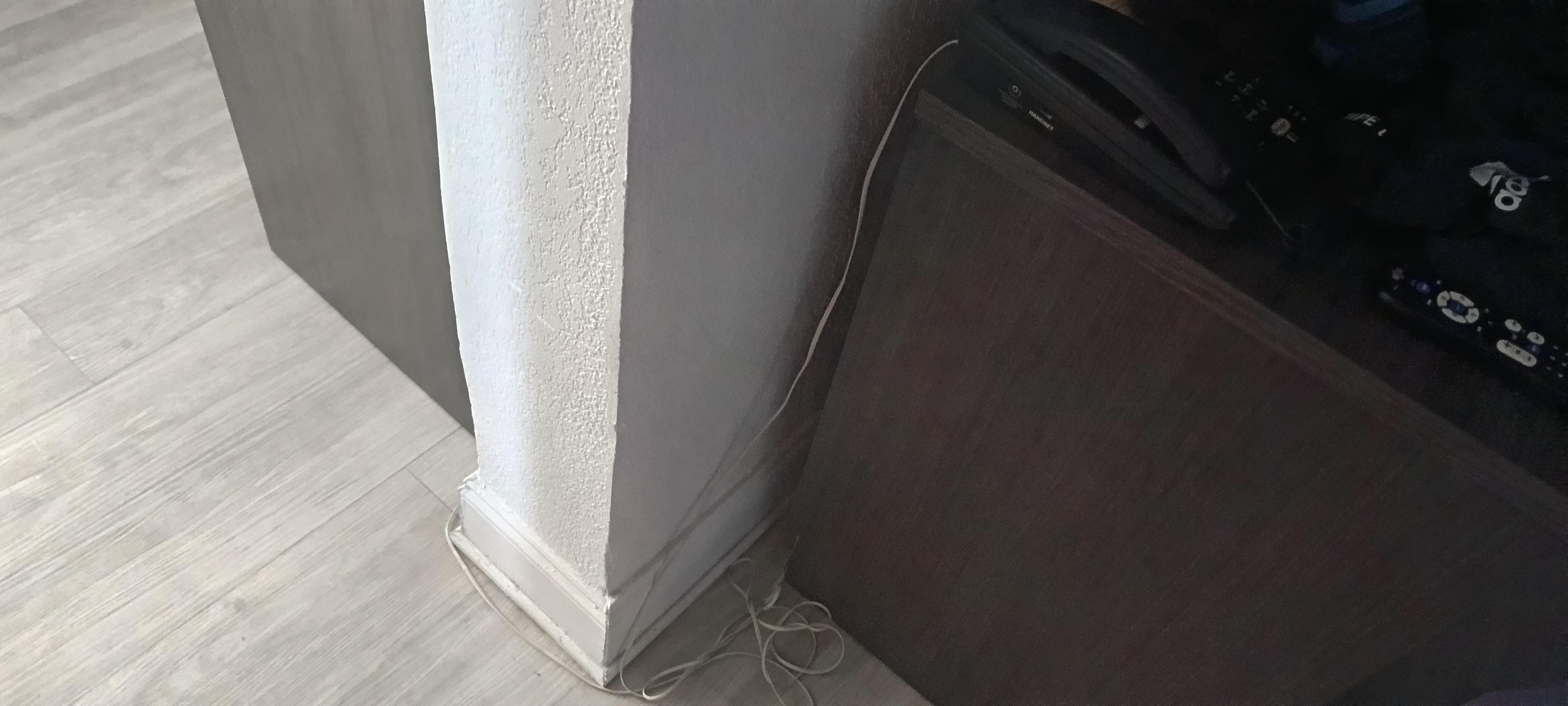 Wiring haphazardly hanging everywhere in this room.