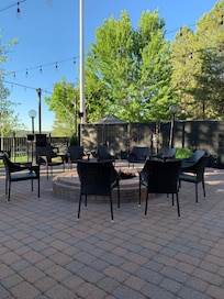 The fire pit area. The staff lights the fire every night and there are sparkly lights surrounding it.