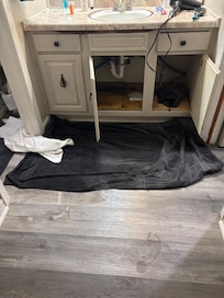 Overflowing sink from washer draining