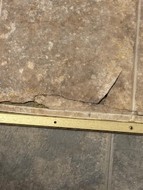 ripped bathroom floor