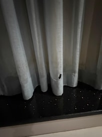minor cosmetic hole in curtain