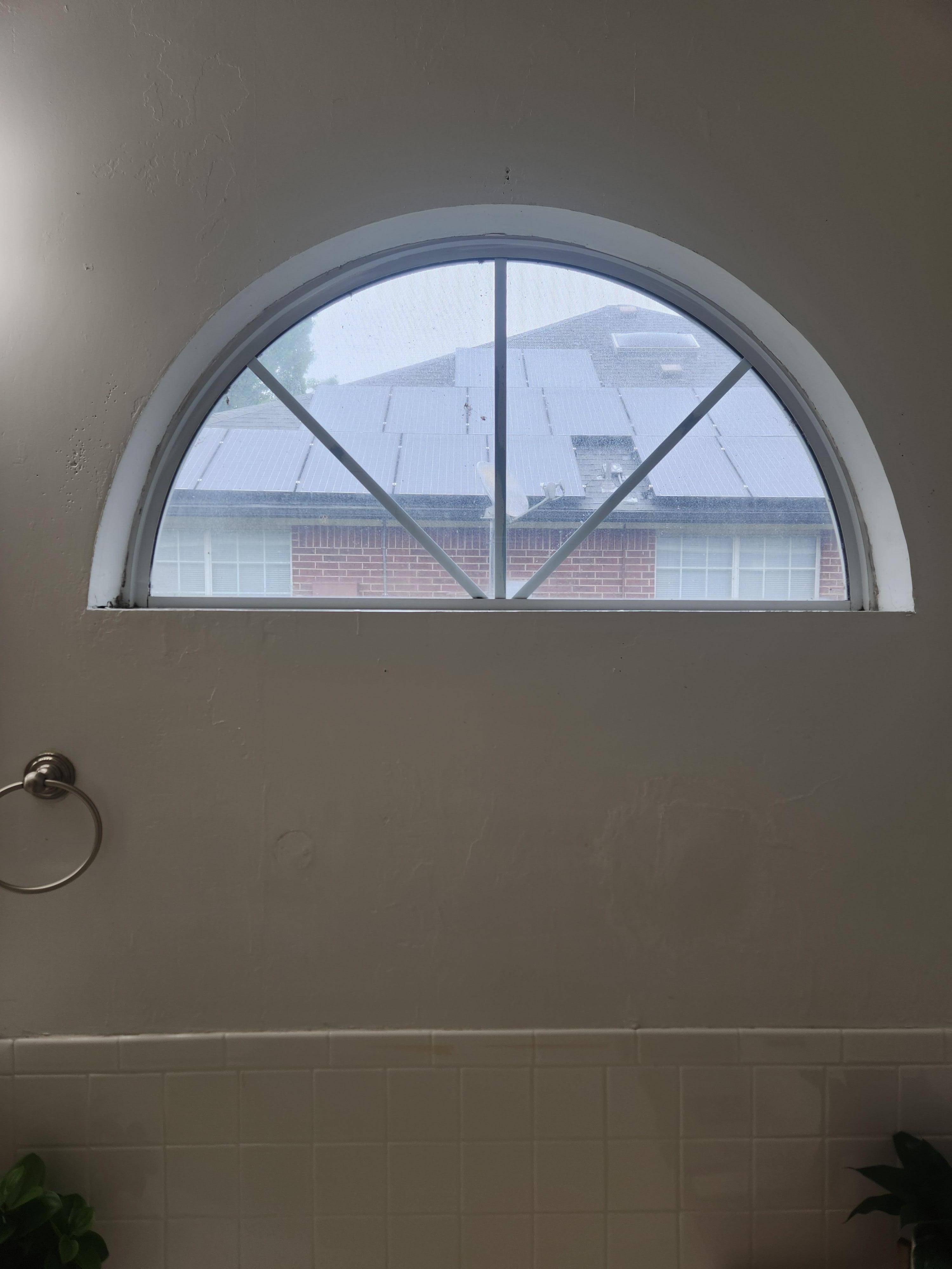 Bathroom window with no covering