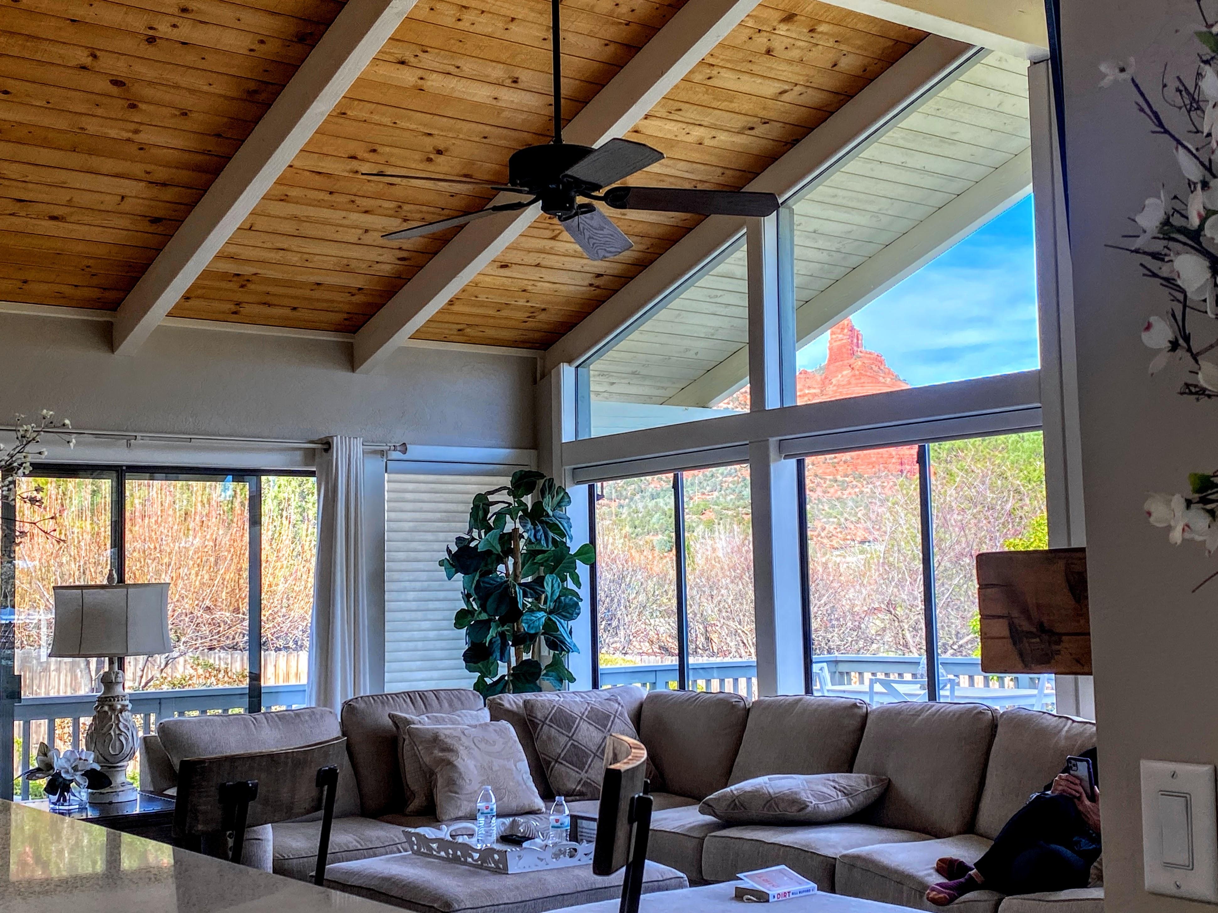 Views of red rocks and large comfy sectional couch