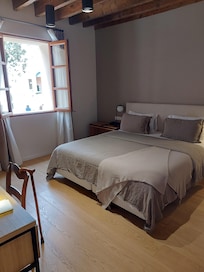 Incredible bed with a great window.