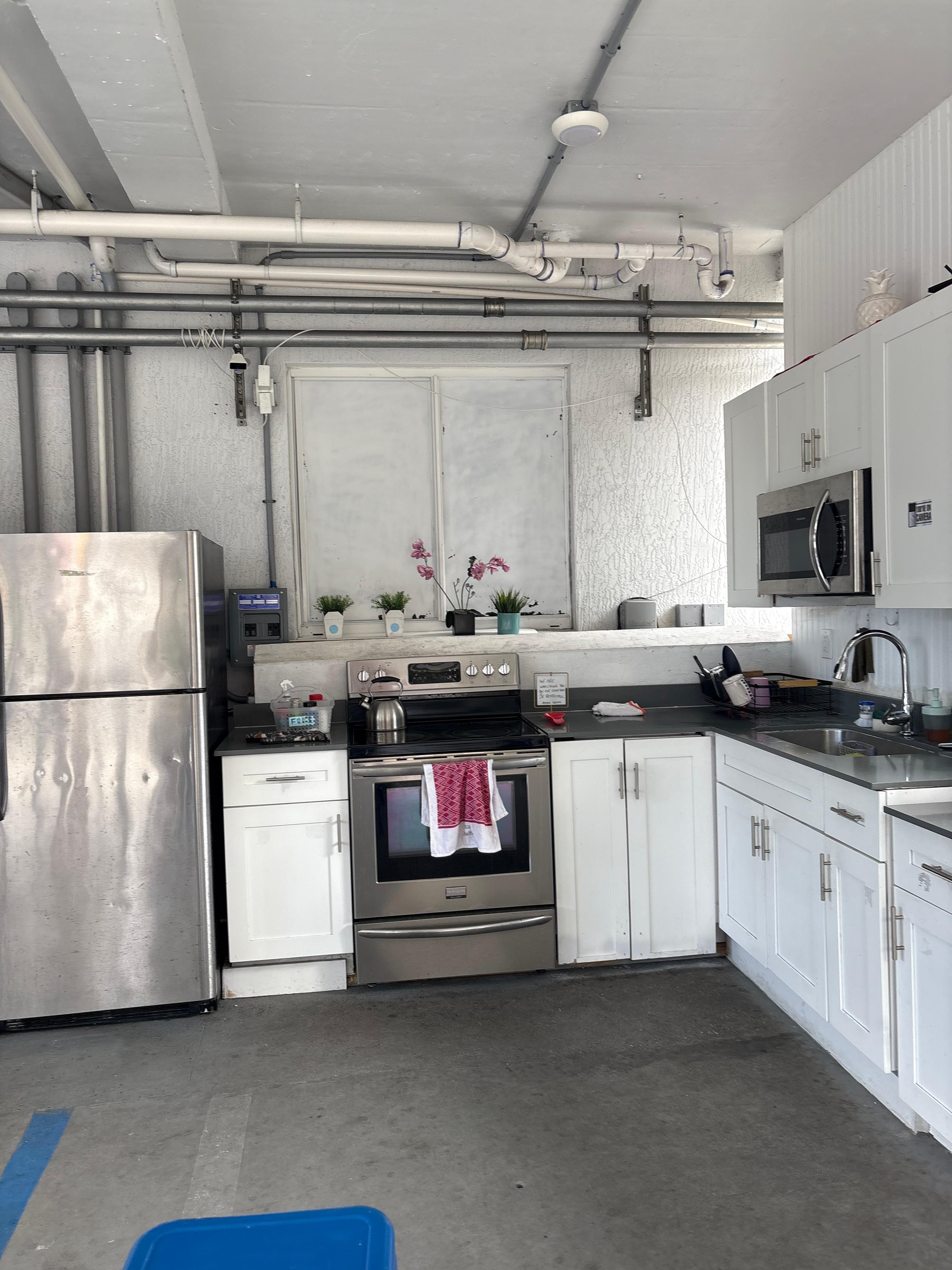 includes three refrigerators