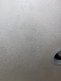 Moldy ceiling with flash