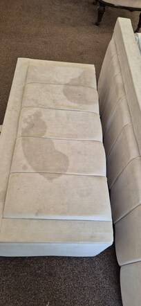 Stains on the seats next to the bed