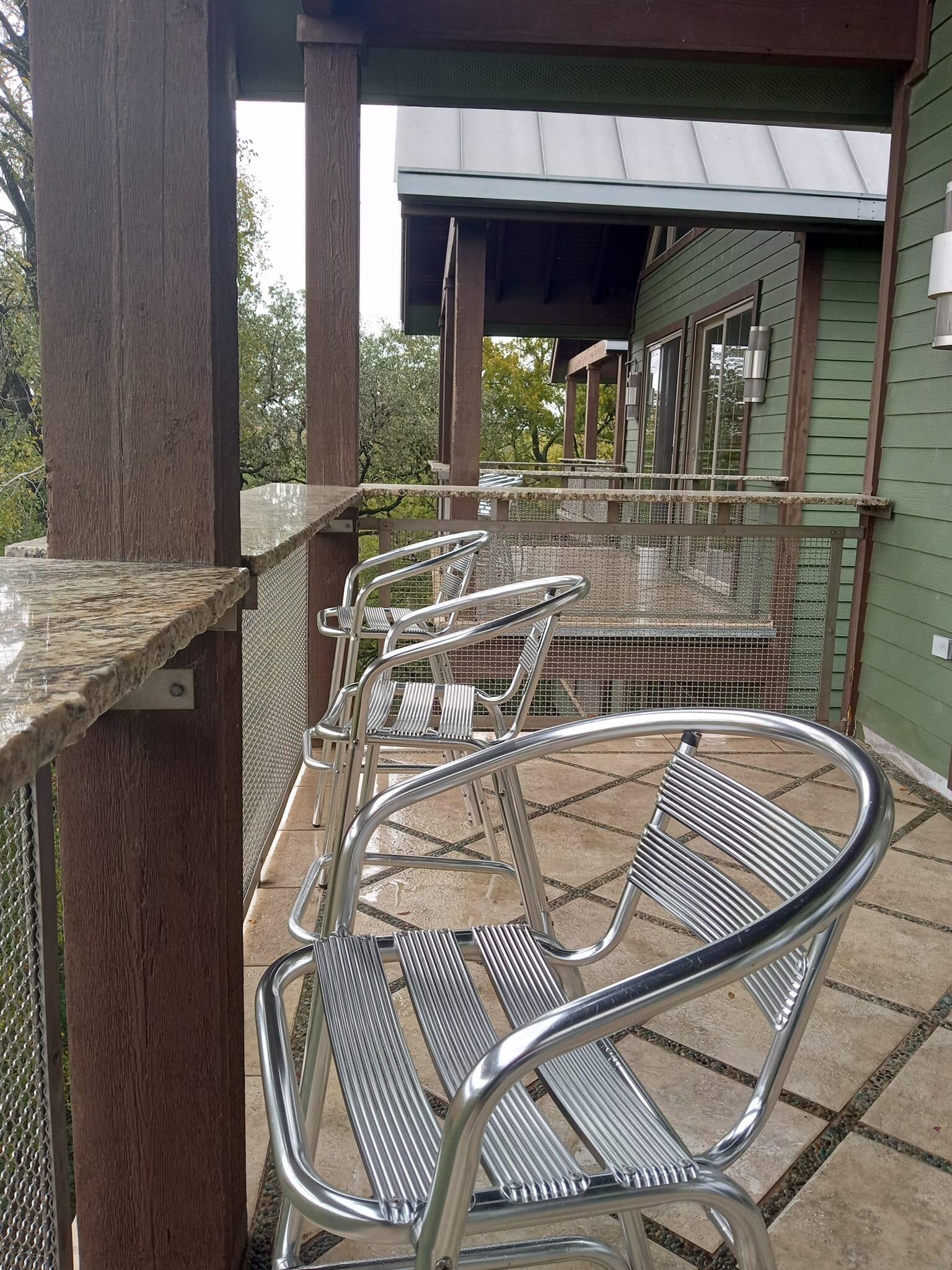 big deck with sitting over looking river