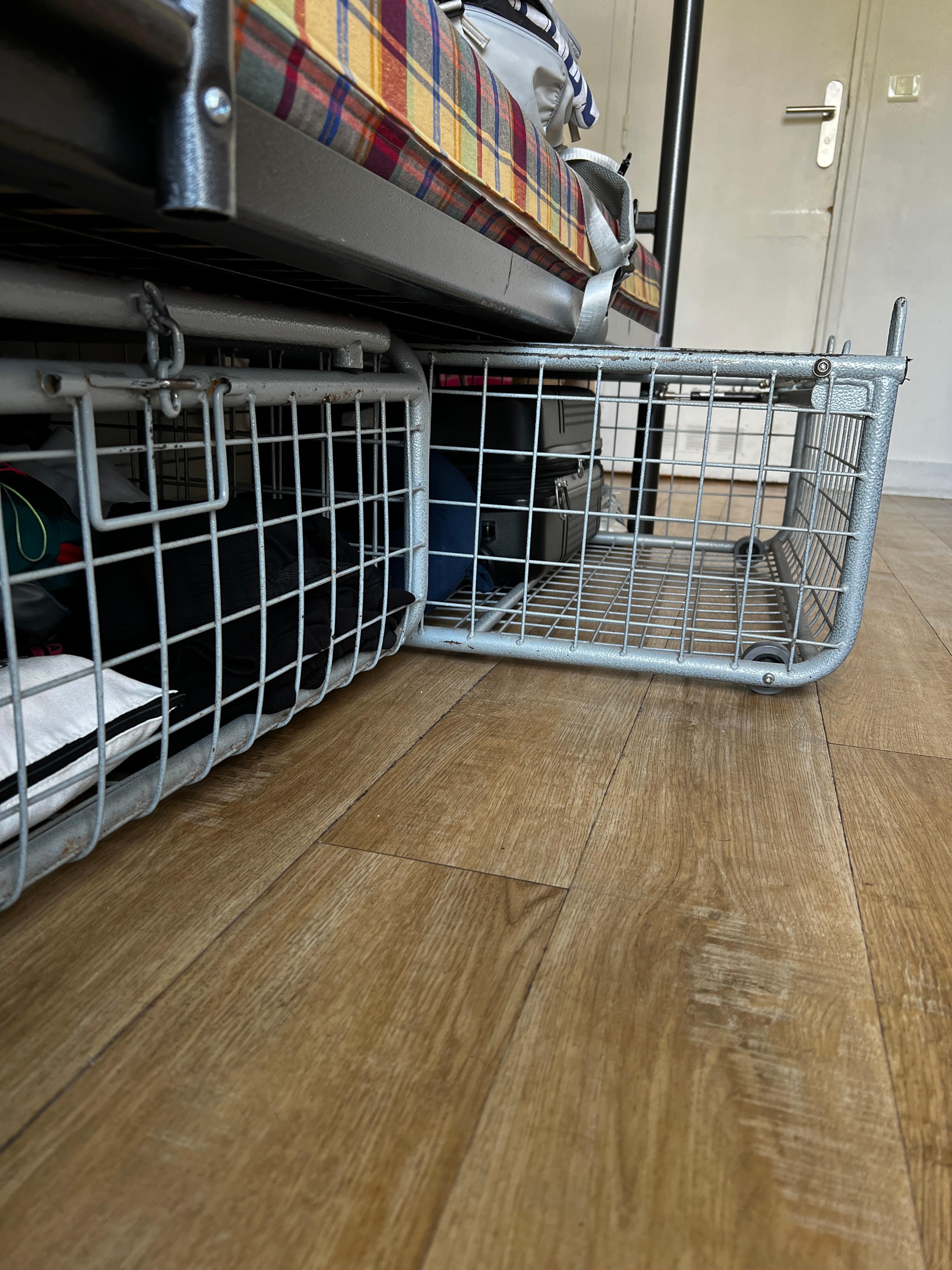 These under bunk storage were useless and dangerous and when rolled out impossible to get past. They also didn’t roll back in or out of someone’s weight was on the bunk. This made for waking people up anytime you wanted to get to your stuff. Horrible