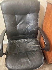 Old torn broken chair