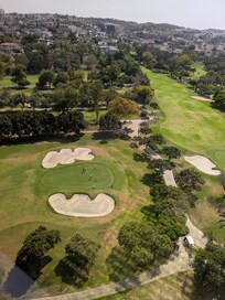 Beautiful views of the golf course in the middle of a major city.