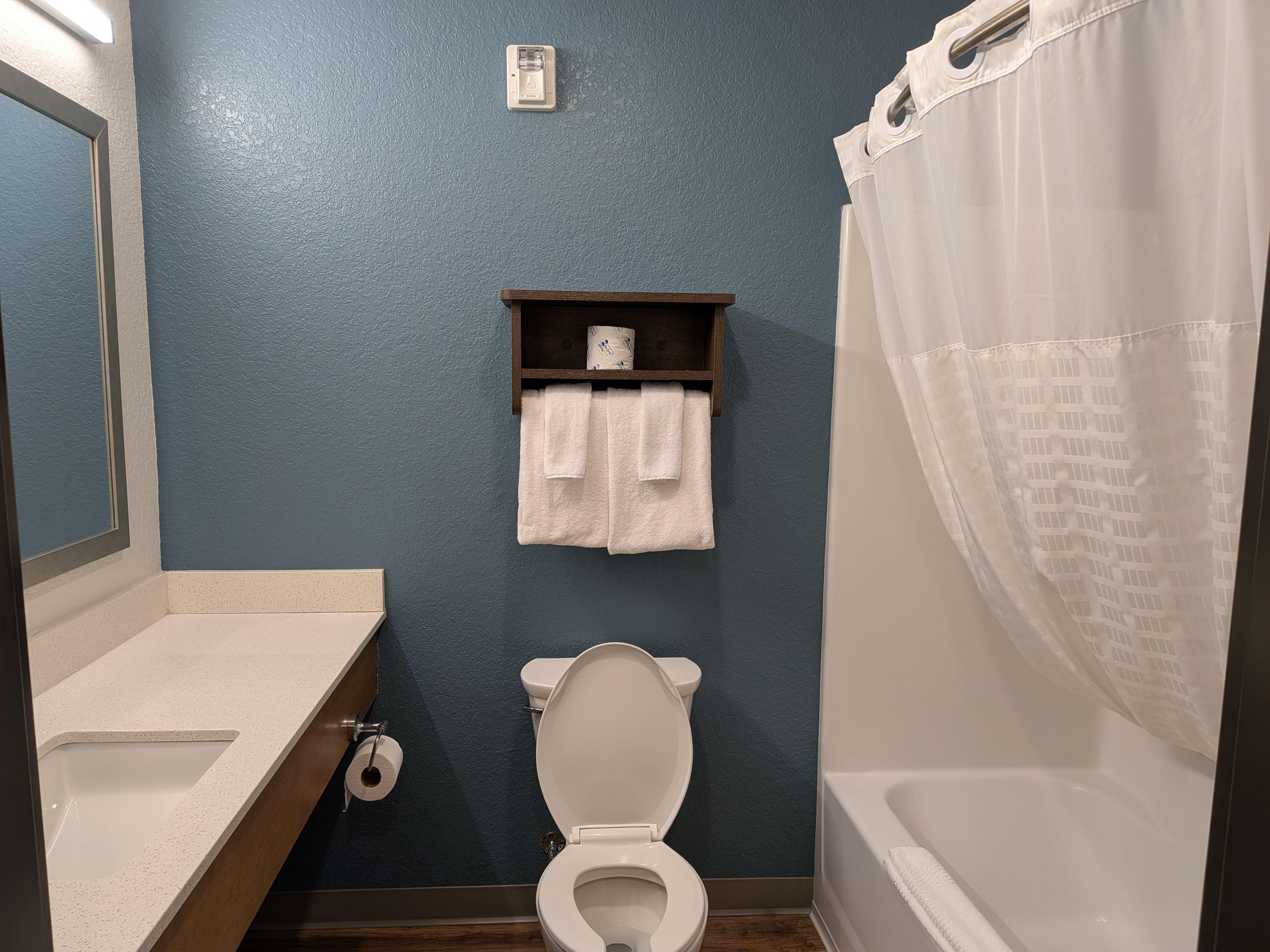 Bathroom with low pressure shower 