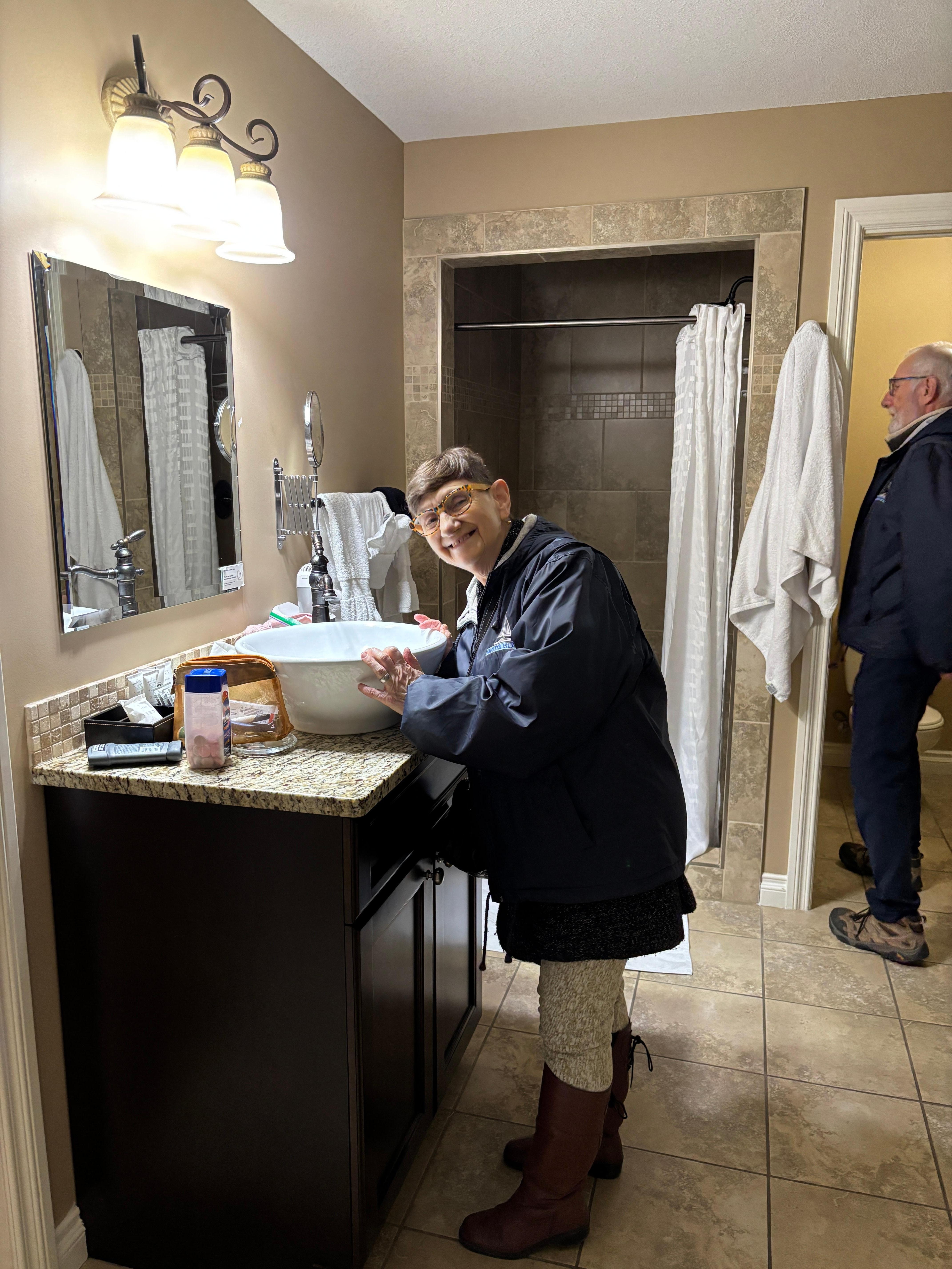 The bathroom sink is so tall my tiny mom had a bit of a struggle. 😅