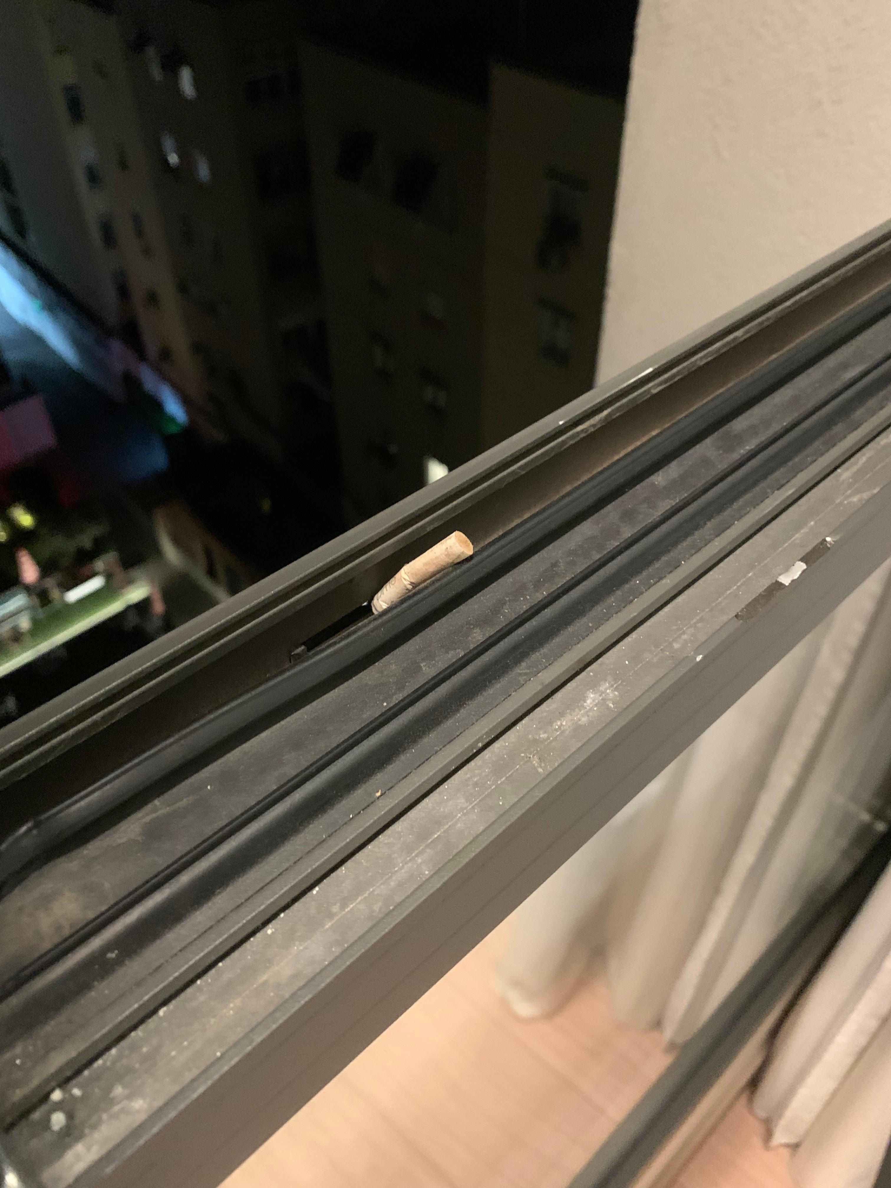 Cigarette butt on window 