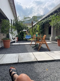 Having coffee in the courtyard