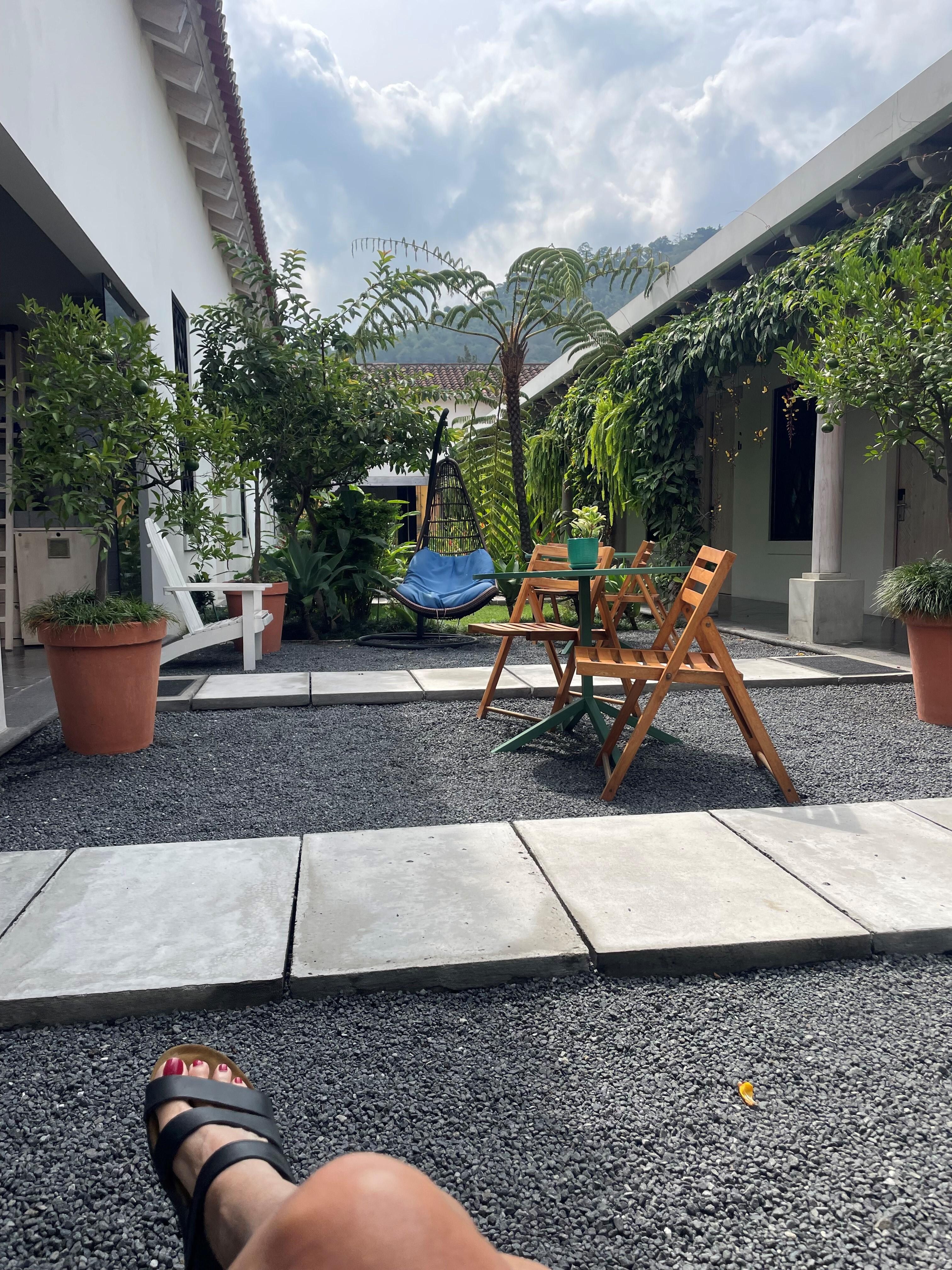 Having coffee in the courtyard