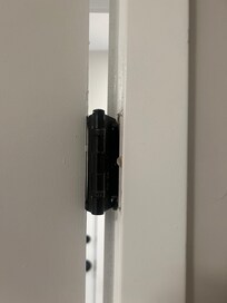 Broken hinge and bedroom dooor in suite wouldn’t shut