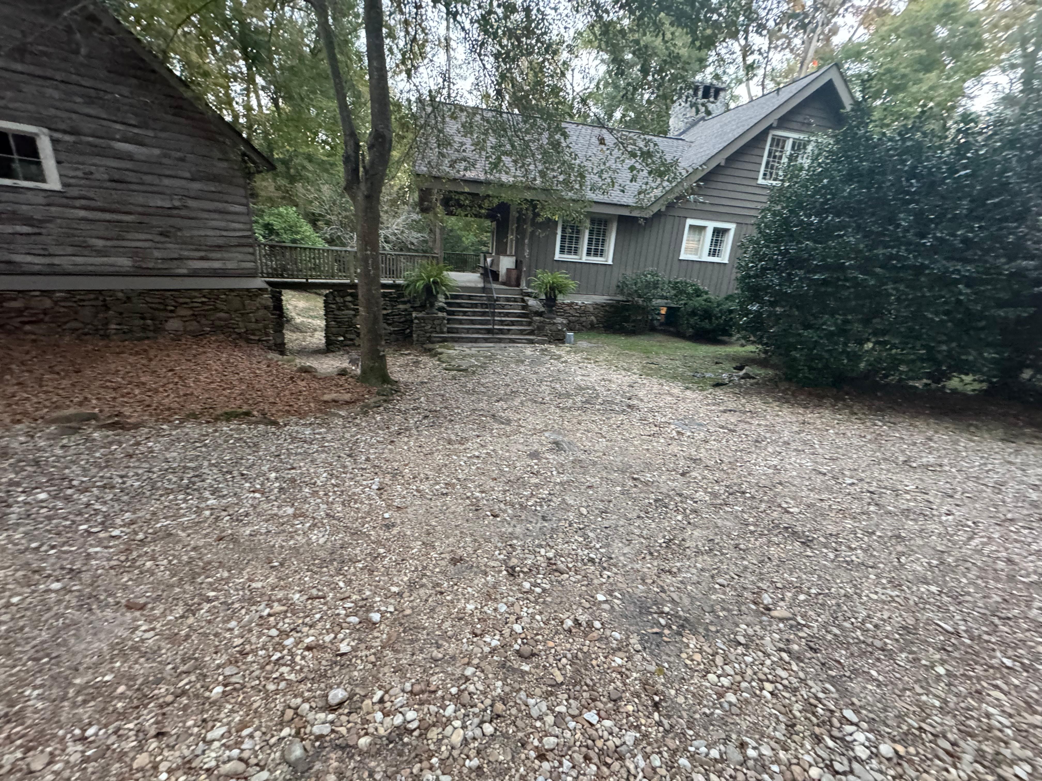 Front exterior with circle drive. 