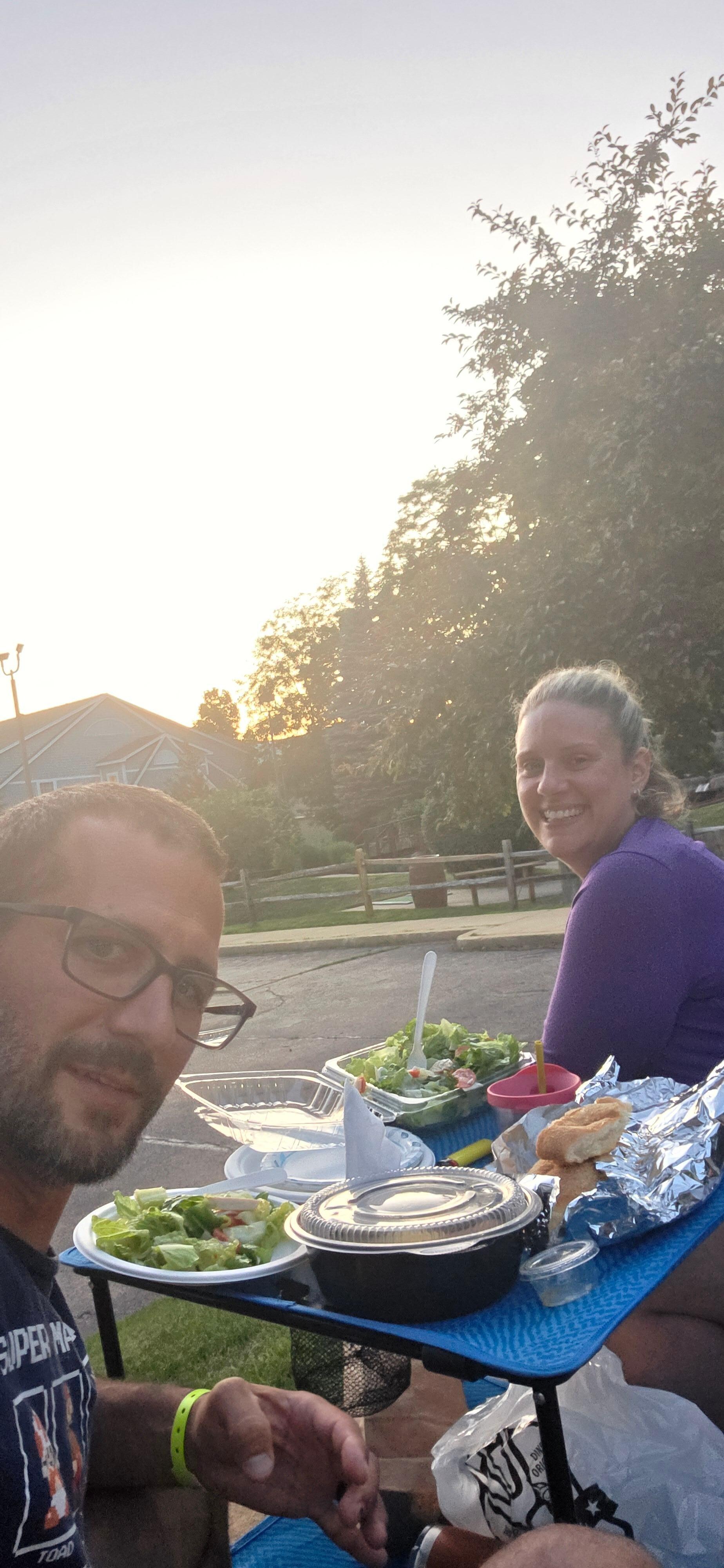 Sunset/moonlit impromtu dinner in parking lot (kids sleeping in car)