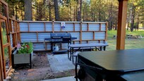 Wonderful new covered patio addition. Hot tub, grill, picnic table.