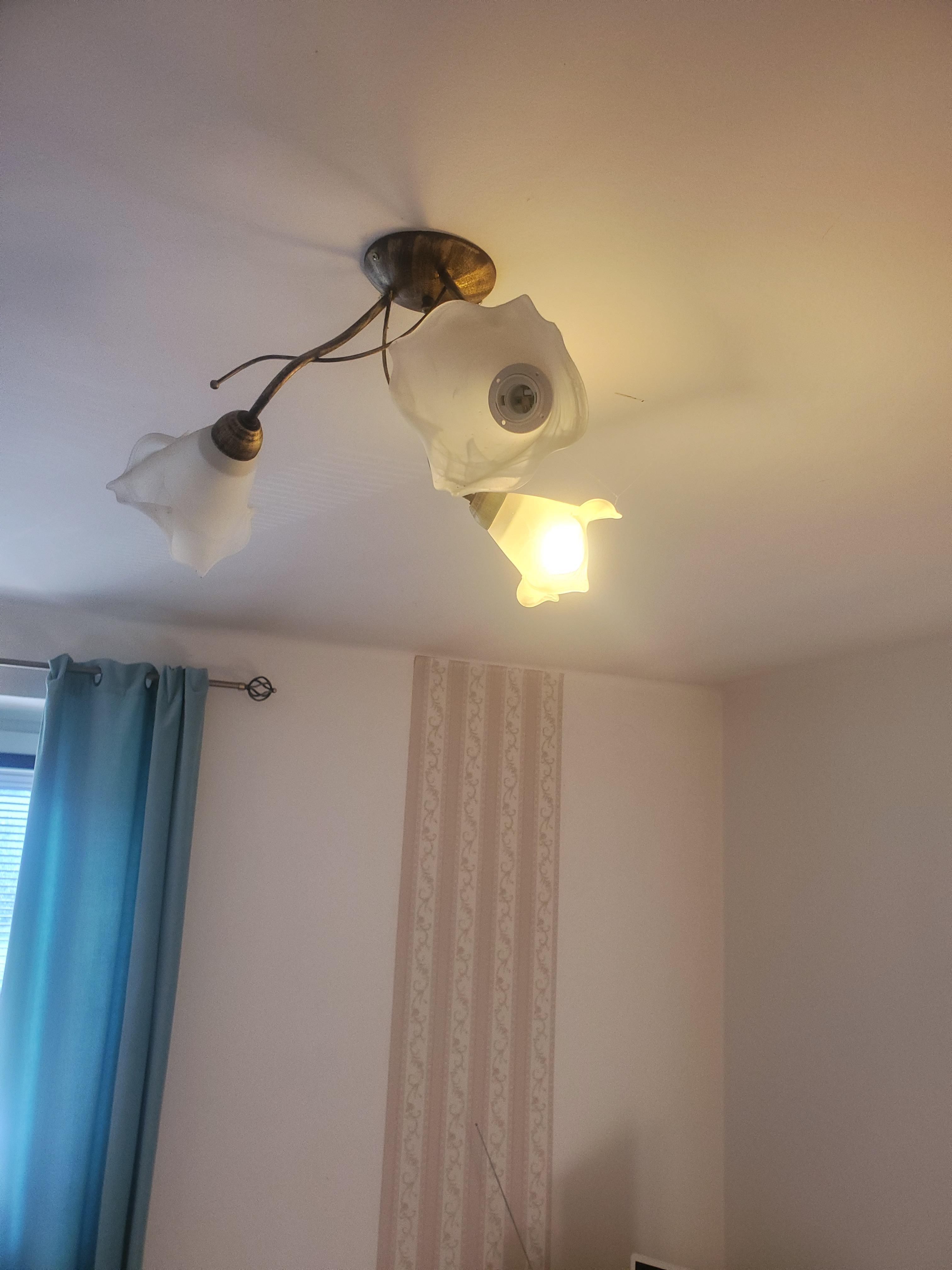 common room light fixture broken and missing bulbs