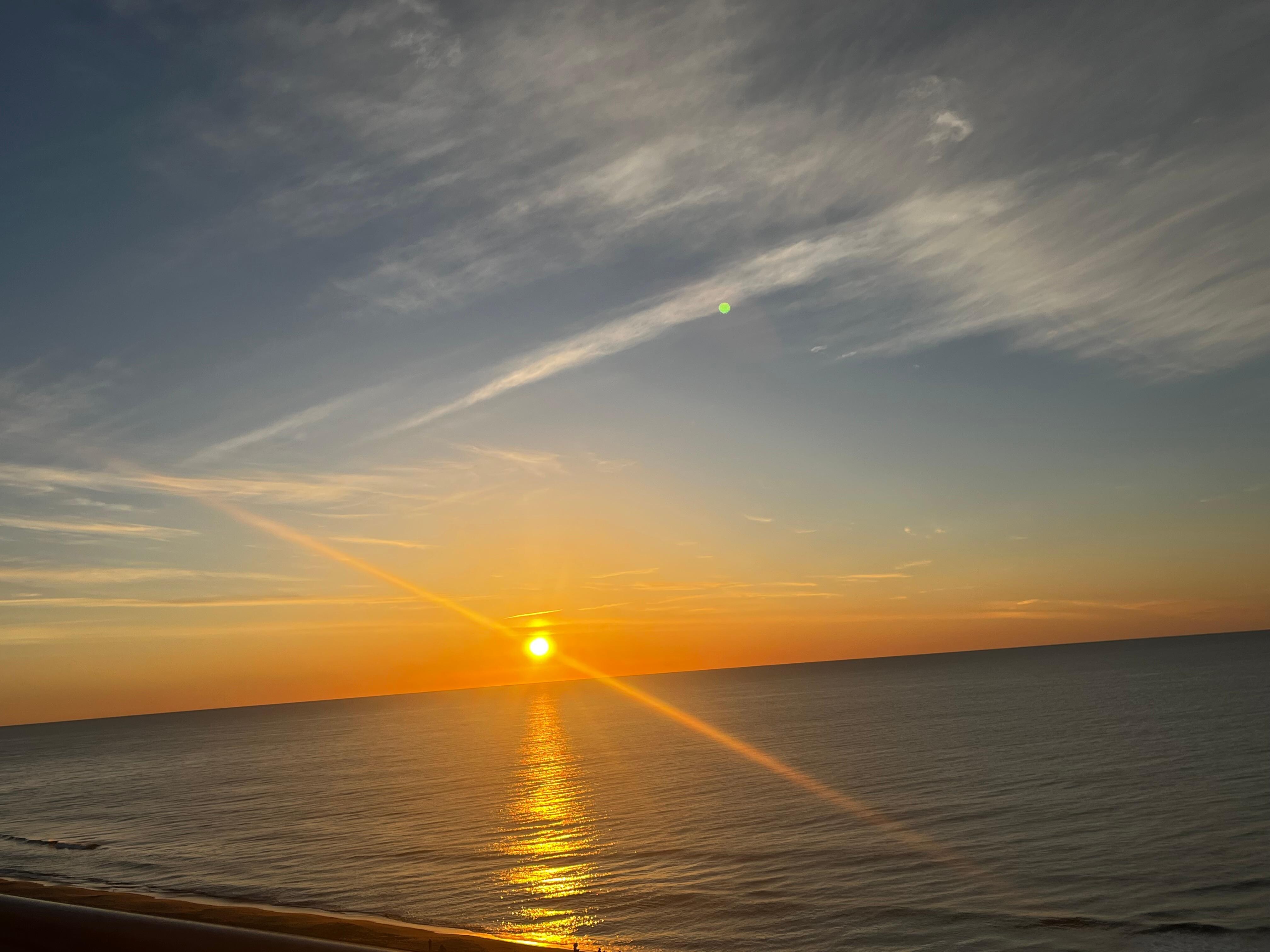 Picture of the sun coming up from the room.