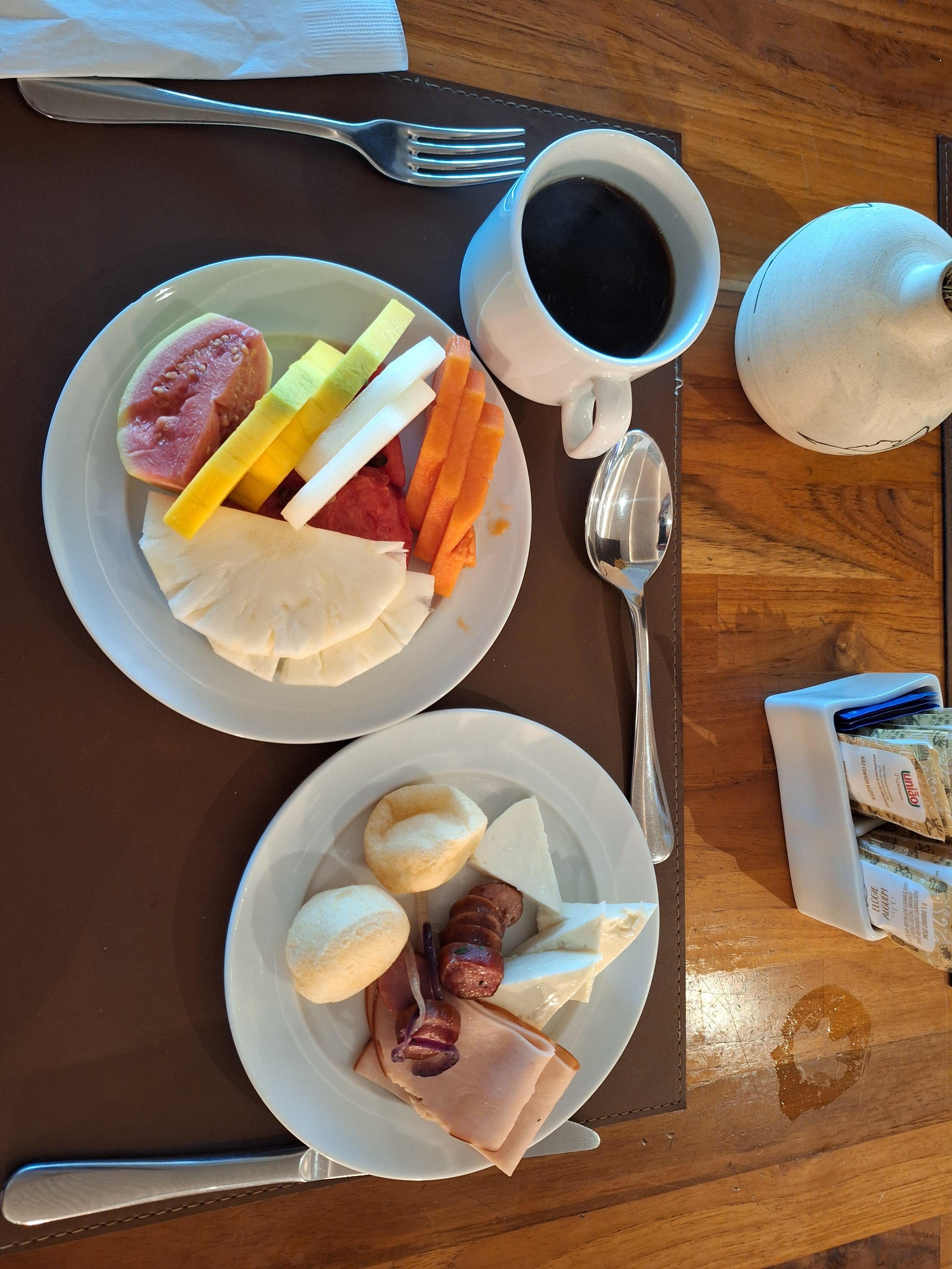 Fruit, sausage, and cheese from breakfast bar.