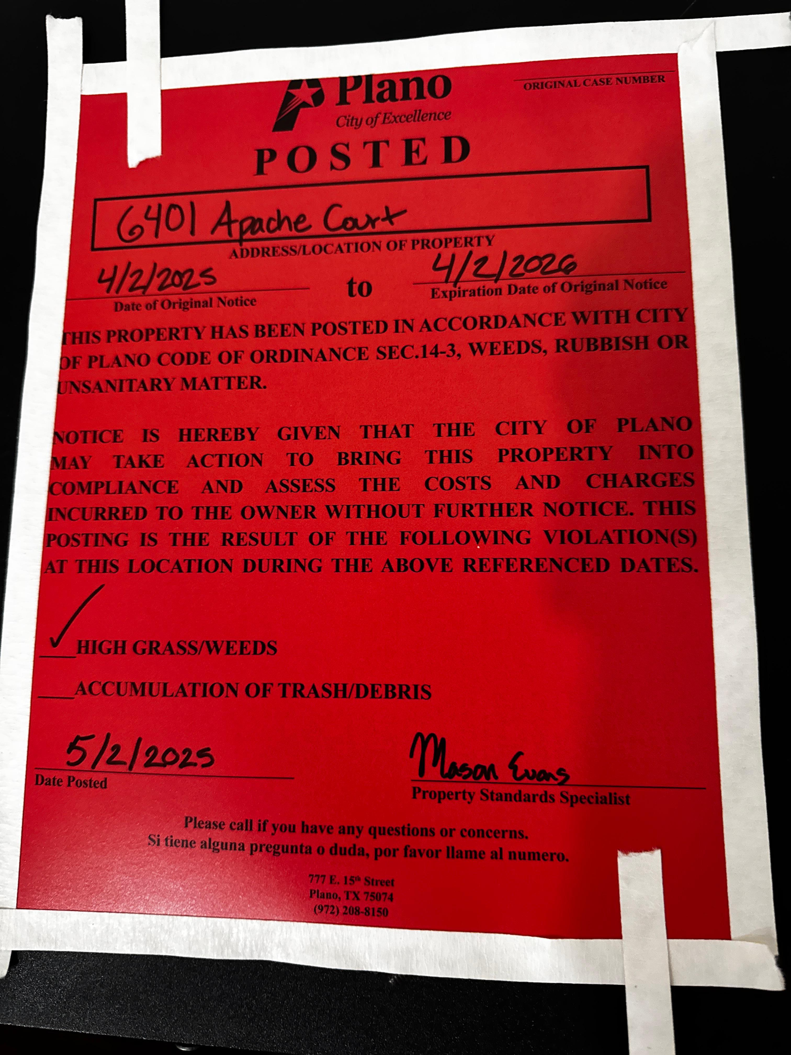 City violation posted on door 