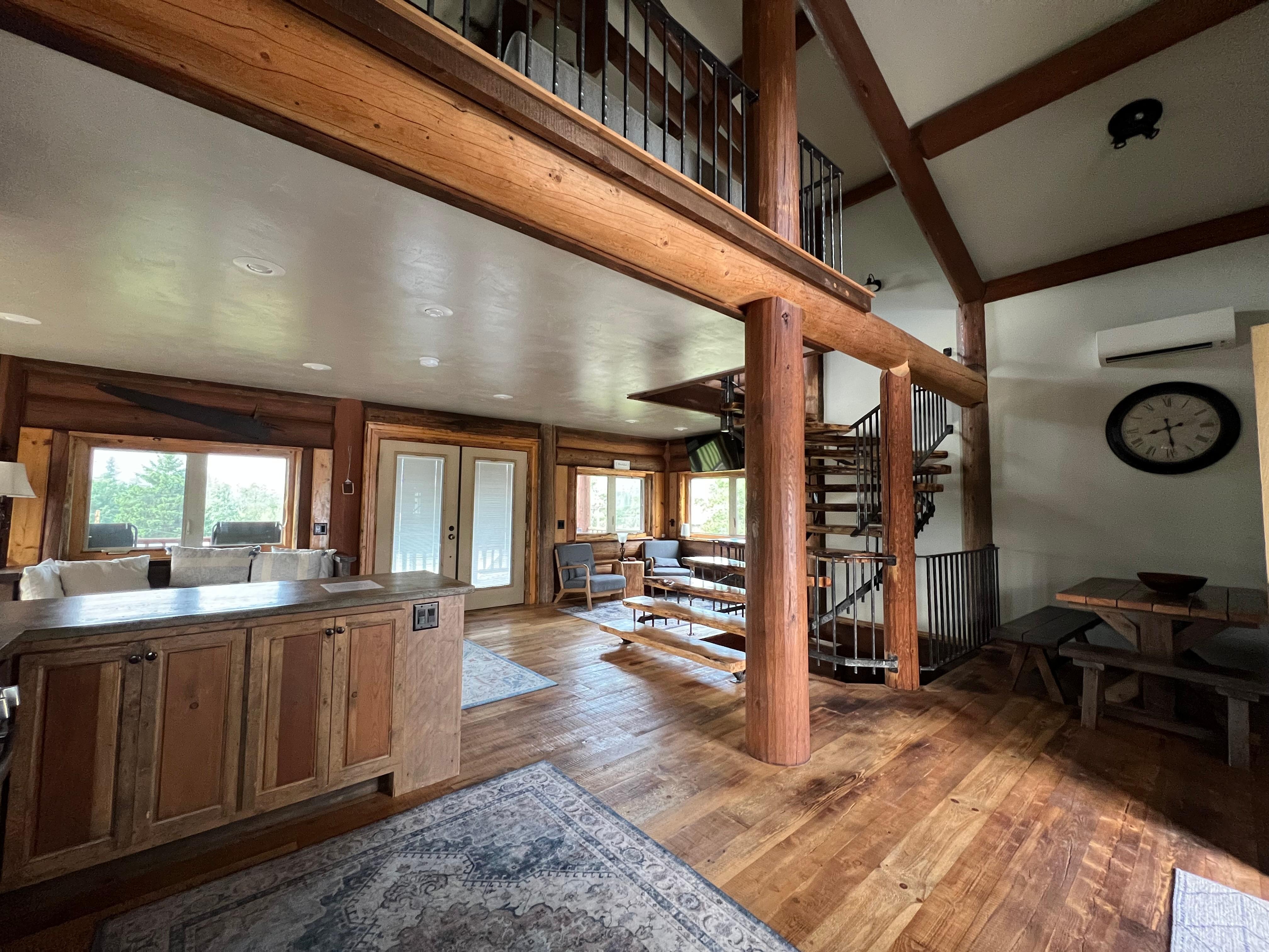 Standing at kitchen sink.