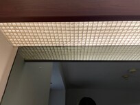 The light fixture above bed area.