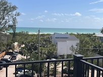View of beach from Top floor deck.